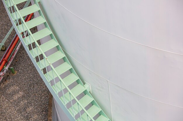 Walking the stairway green storage tank chemical.