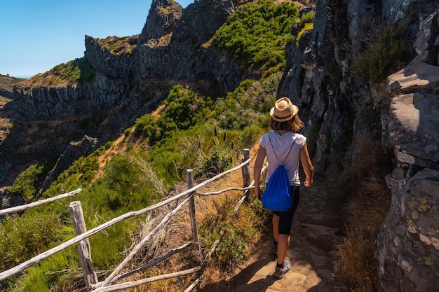 Walking towards Pico do Arieiro from Ninho da Manta viewpoint Madeira Portugal