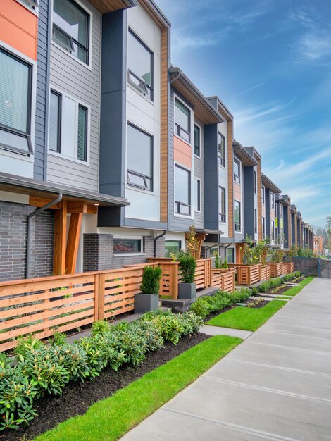 Photo walkway along a row of brand new townhouses on sale stage