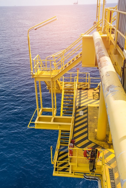 Walkway offshore Industry oil and gas production petroleum pipeline.