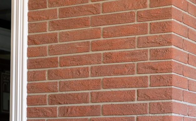 The wall of the bar is covered with decorative red brick Interior design in the restaurant Modern renovation of office space