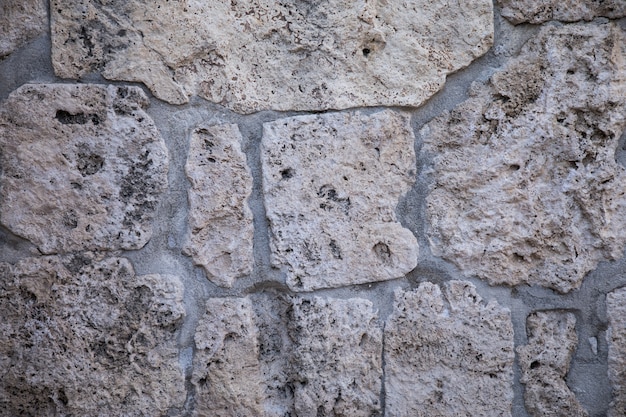 Wall of basalt stones as a background