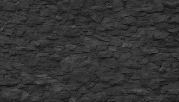 A wall of black stone with a rough texture.