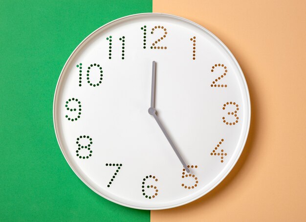 wall clock show five o'clock