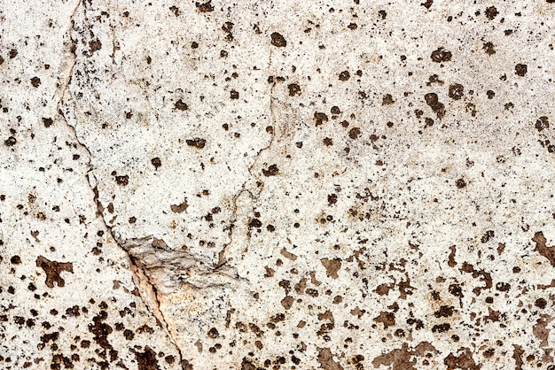 Wall concrete texture background. Wall fragment with scratches and cracks