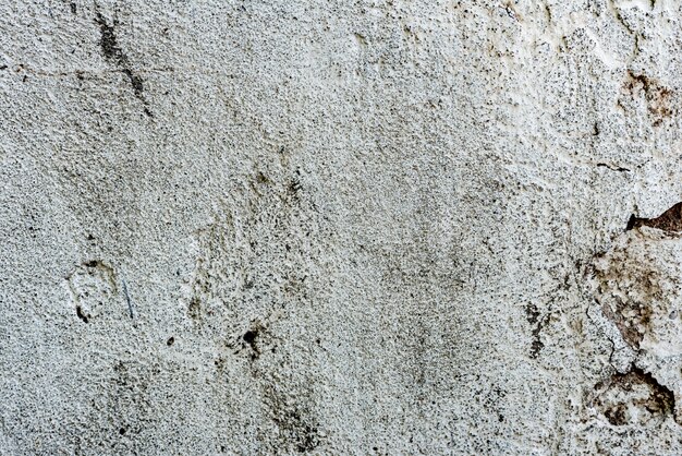 Wall fragment with scratches and cracks background