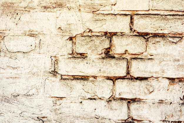 Wall fragment with scratches and cracks