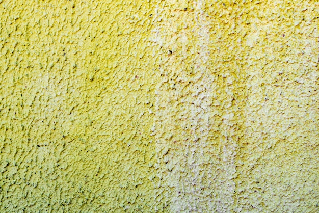 Wall fragment with scratches and cracks