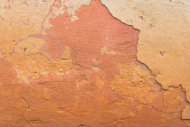 Wall fragment with scratches and cracks