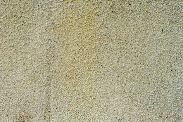 Wall fragment with scratches and cracks