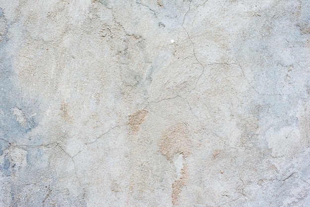 Wall fragment with scratches and cracks