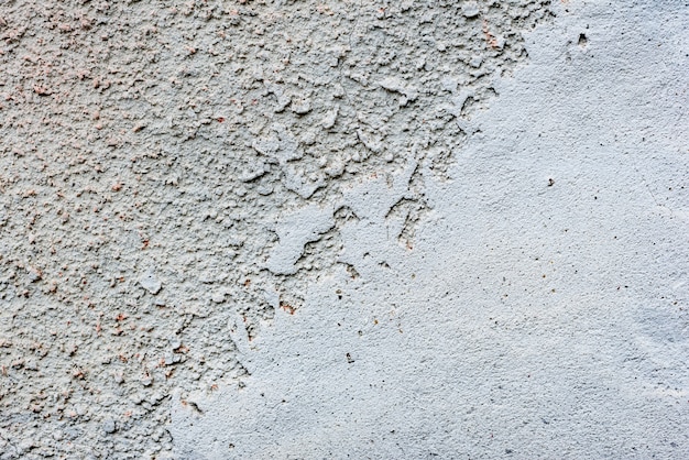 Wall fragment with scratches and cracks