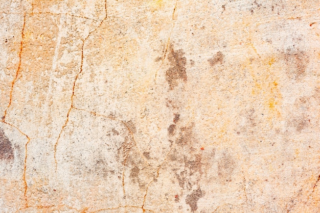 Wall fragment with scratches and cracks