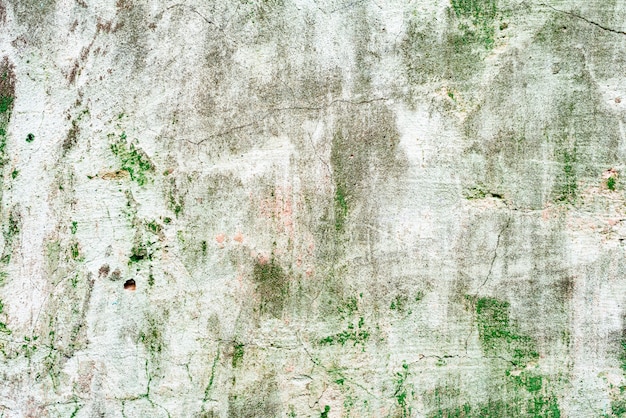 Wall fragment with scratches and cracks