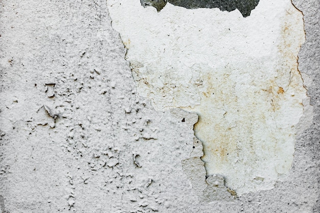 Wall fragment with scratches and cracks