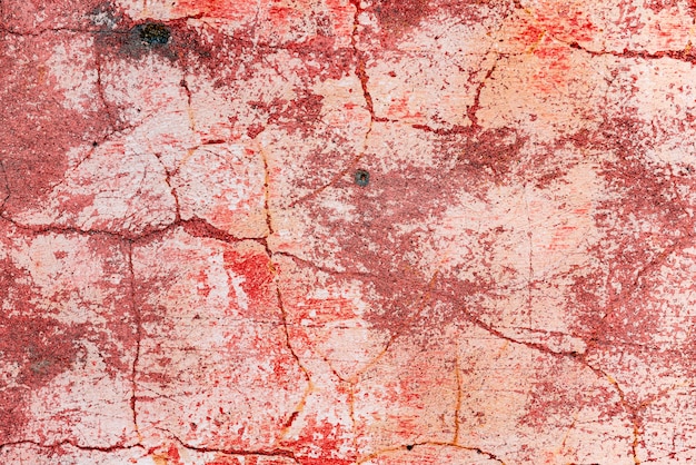 Wall fragment with scratches and cracks