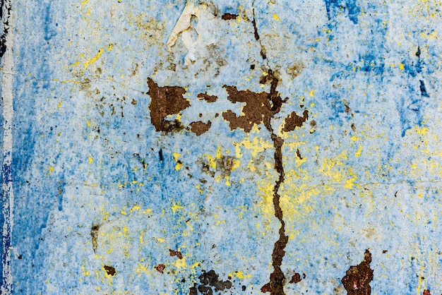 Wall fragment with scratches and cracks