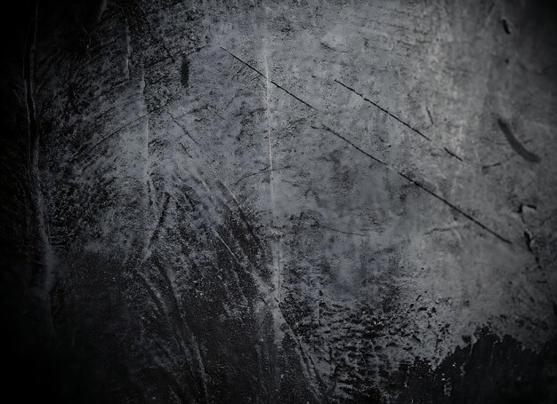 Photo wall full of scratches grungy cement texture for background scary dark wall black wall