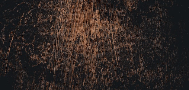 Wall full of scratches Grungy cement texture for background Scary dark wallBlack wall