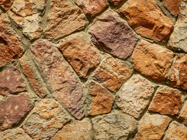 Wall made of old stones on a beach in egypt