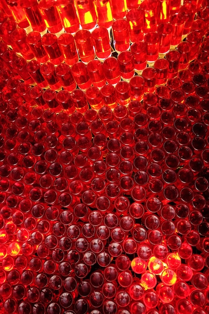 Wall made of red bottle bottoms