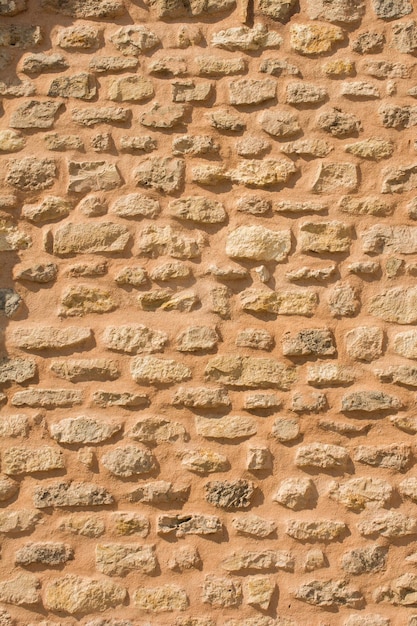 Photo wall made of the same type of stones