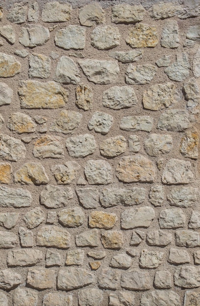 Photo wall made of the same type of stones