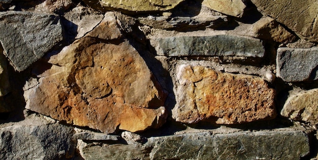 Photo a wall made of stones