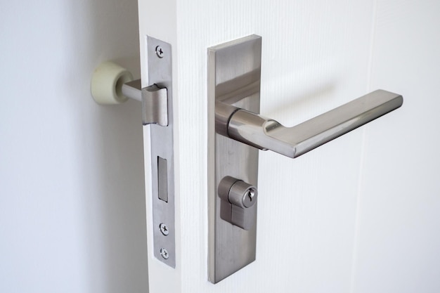 Wall mounted door stopper with modern door handle