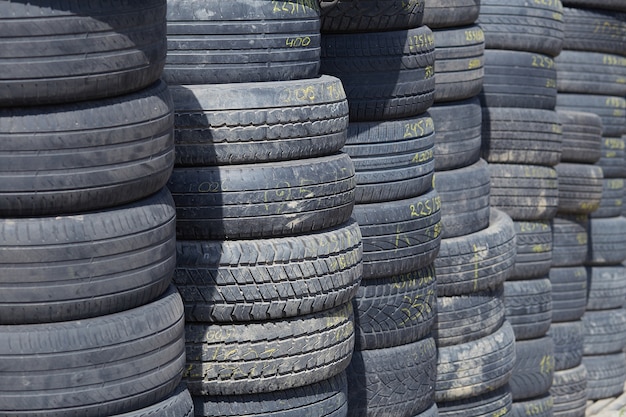 A wall of old car tires