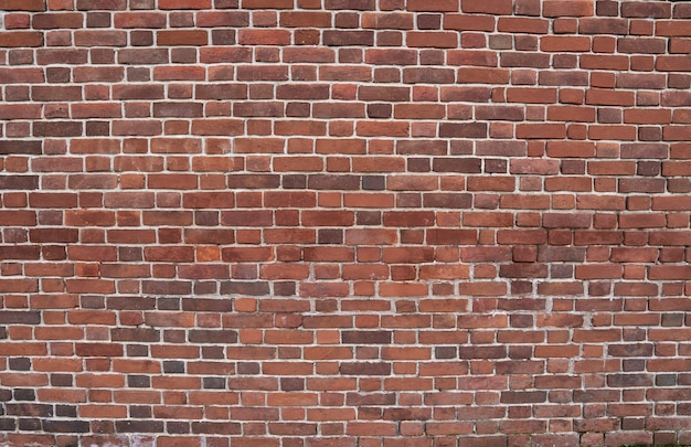 Wall of old red brick. brick background. texture