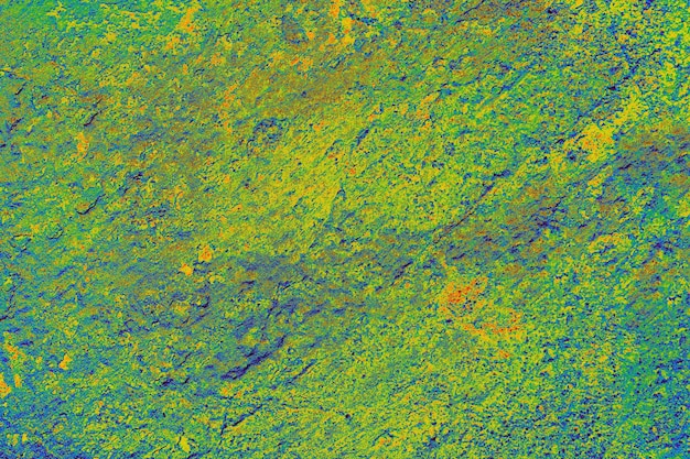 抽象的な背景の質感として様々な色で塗装された壁の表面