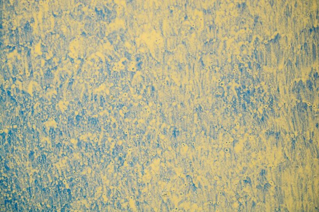 Wall surface painted of various colors as abstract background texture