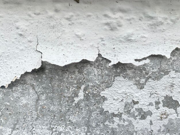 A wall that has a crack in it that has been damaged.