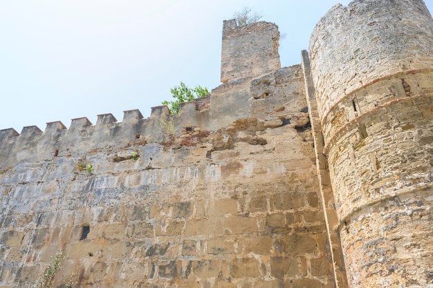 wall and tower of medieval castle in Marbella Andalucia Spain