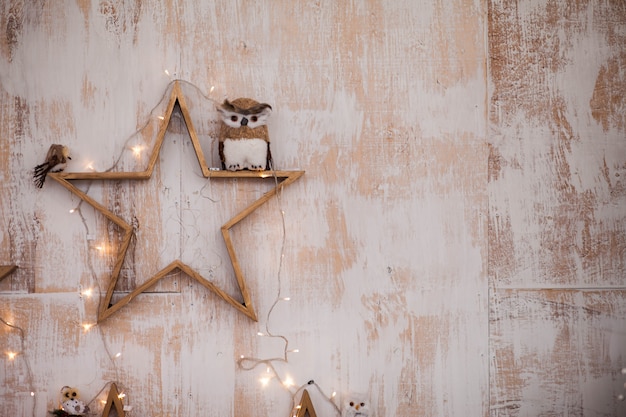 Wall with scenery in stars and garlands