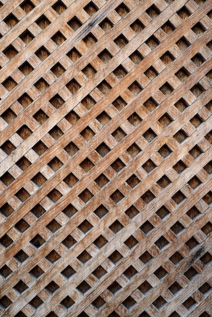 A wall of wooden planks joined at an angle.