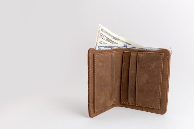 Photo wallet with dollars sticking out of it