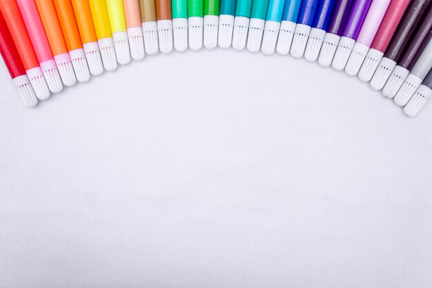 Wallpaper background colourful coloring pen on white background with copy space