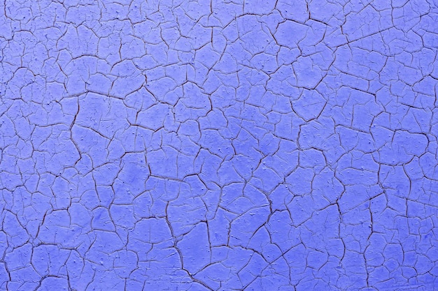 Photo wallpaper of cracked violet backgroundmock up damaged surface