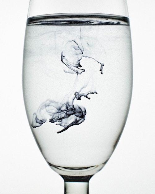 Photo wallpaper of ink in glass