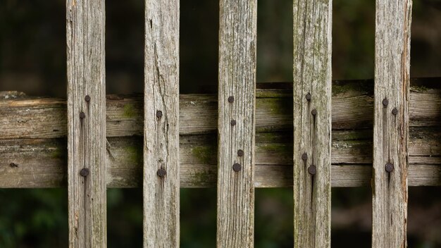 Photo wallpaper of structured planks nailed together in close up