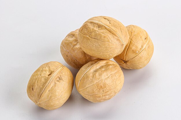 Walnut kernel heap organic nut isolated