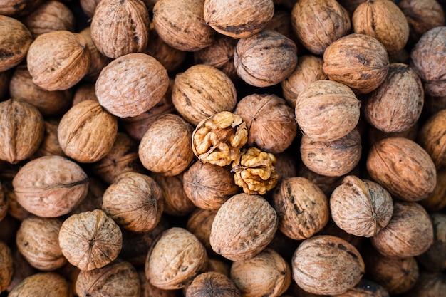 Walnut kernels on natural walnut pattern background