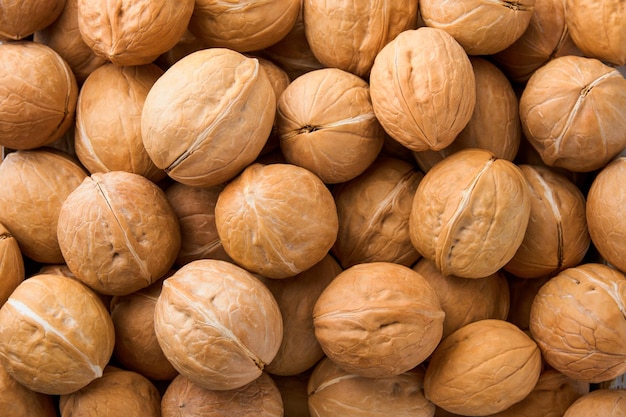 Photo walnut nuts texture food background top view close up