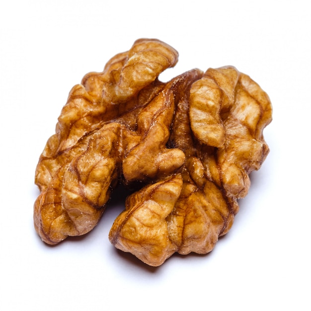 Walnut peeled on white table