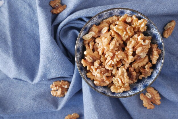 Walnut on a plate on table  close up