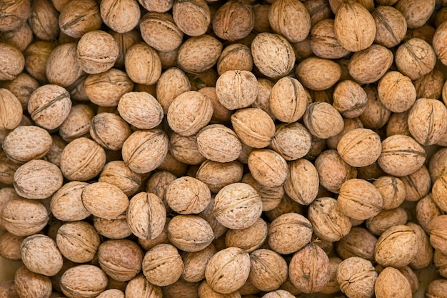 Walnuts background, nuts texture