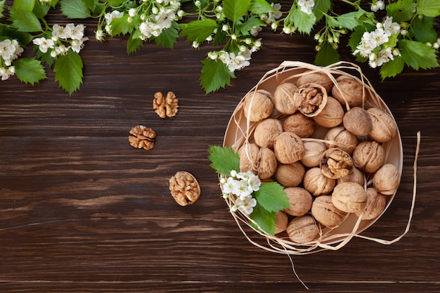 Walnuts on brown wooden table