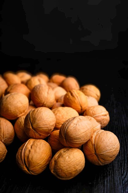 Walnuts on a dark table